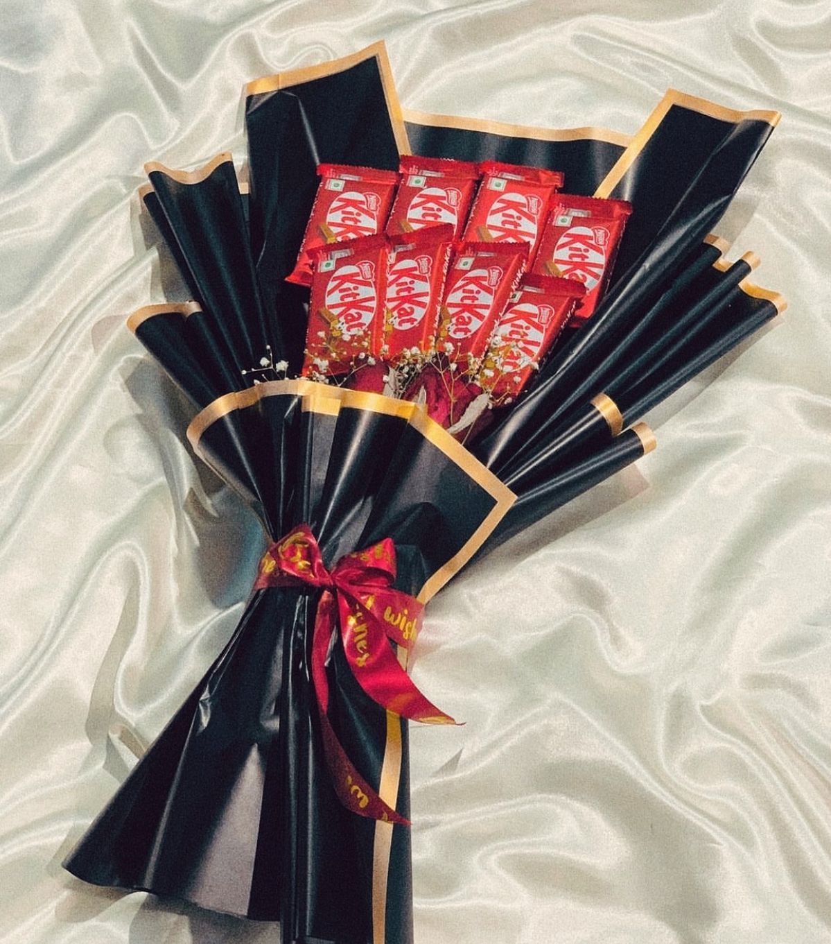 WhatsApp Image 2026-02-10 at 7.58.47 PM KitKat Chocolate Bouquet in Black & Gold Wrap - Image 1