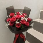 Elegant Red Rose & Baby's Breath Bouquet in Black Matte Wrap