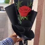 Single Red Rose in Elegant Black Wrap